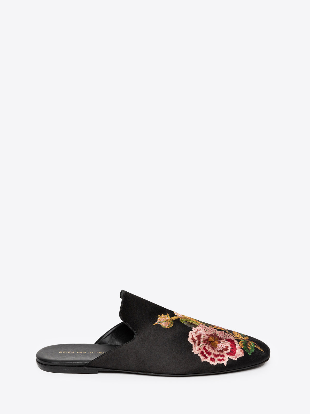 Black slipper with floral embroidery on a white background