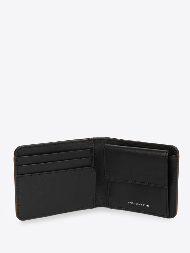 Black inside of a brown leather wallet on a white background