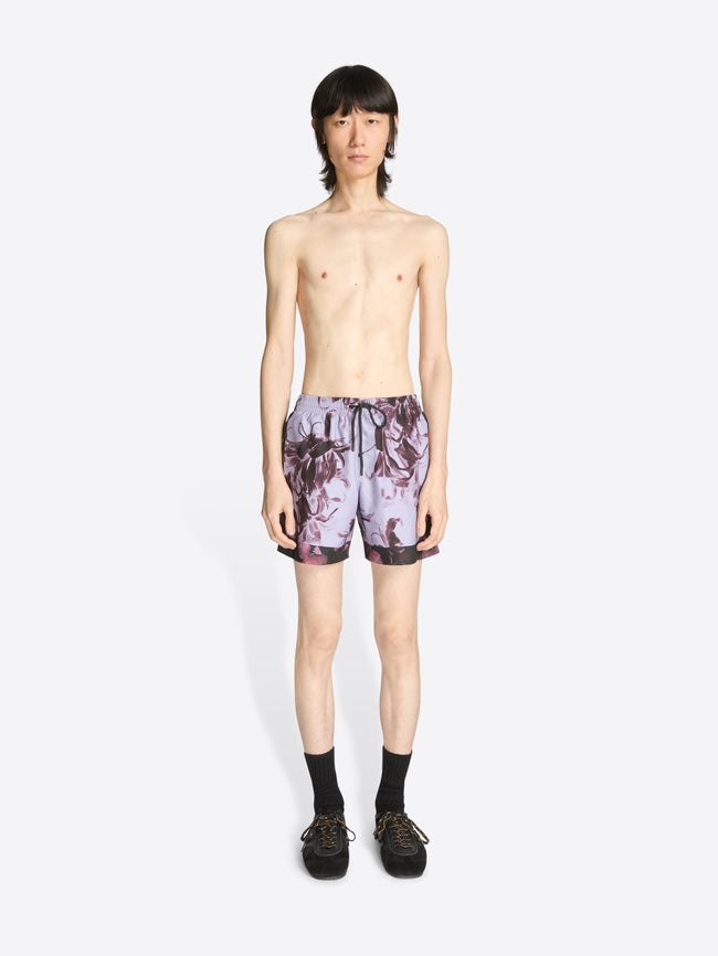 Model wearing Printed swim shorts - Dries Van Noten