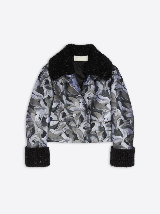 Patterned jacket with black trim on a white background