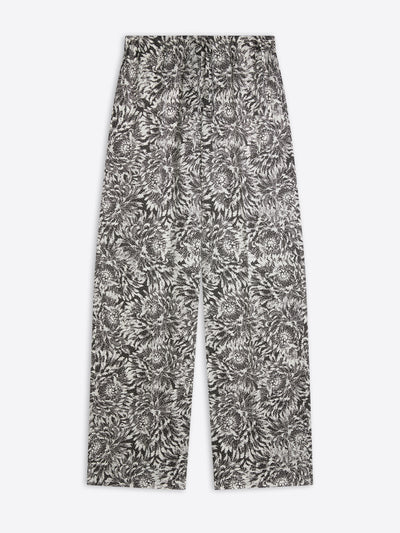 Ecru colored, floral printed elasticated pants on a white background - Dries Van Noten