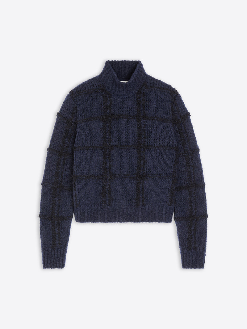 Navy blue textured sweater on a white  background