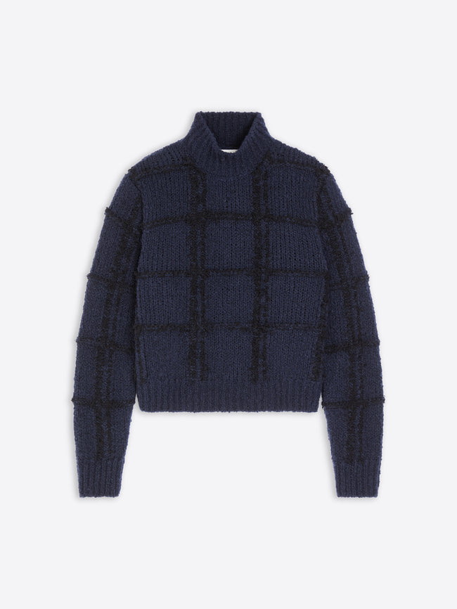 Navy blue textured sweater on a white  background