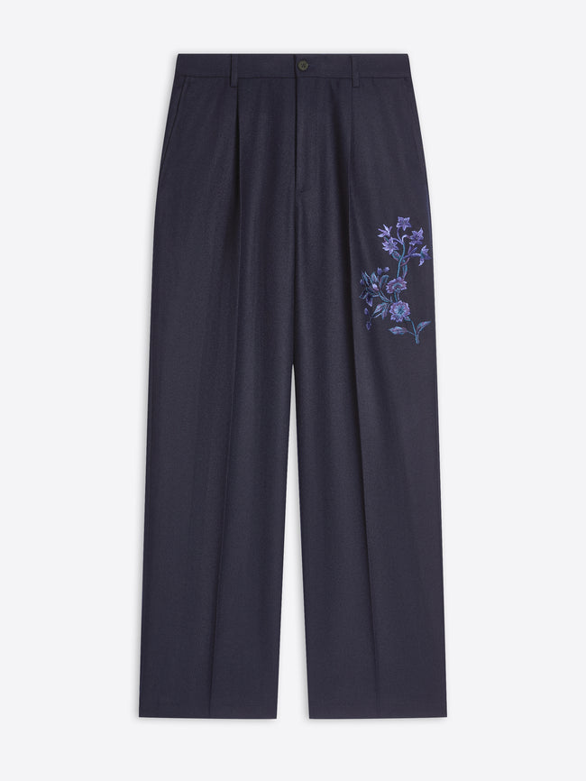 Navy pants with floral embroidery on a white background
