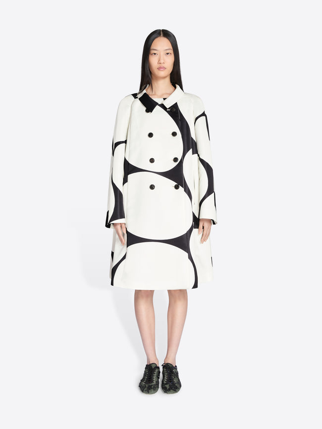 Woman wearing a black and white patterned dress on a white background - Dries Van Noten