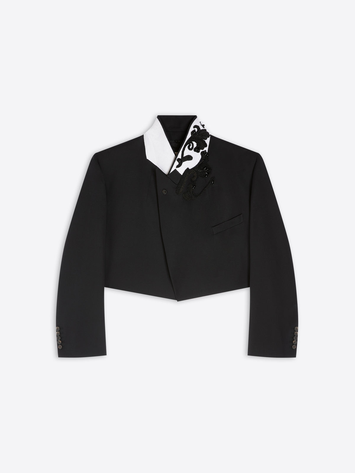 Black cropped tuxedo jacket with black and white patterned details on a light gray background - Dries Van Noten