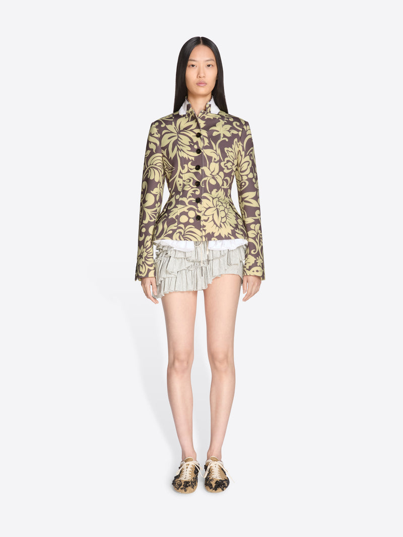 Model wearing a patterned outfit on a white background - Dries Van Noten