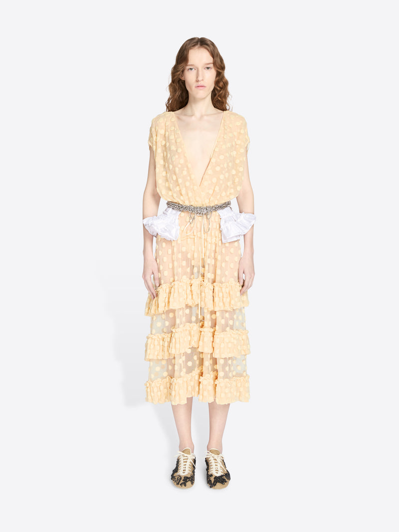 Woman wearing a yellow dress with a white background - Dries Van Noten