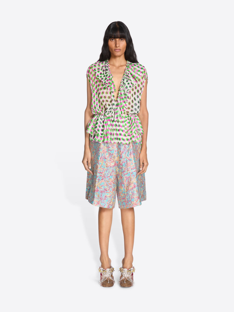 Woman wearing a patterned dress on a white background - Dries Van Noten