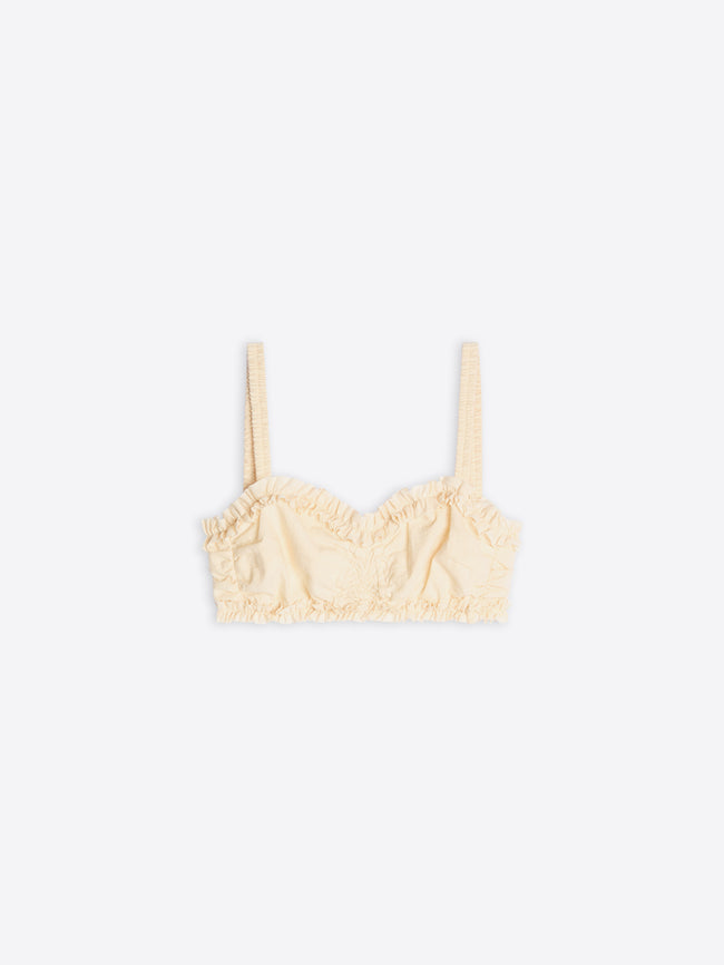 Cream-colored bralette with lace details on a white background - Dries Van Noten