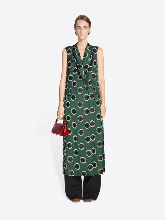 Woman wearing a green patterned dress on a white background - Dries Van Noten