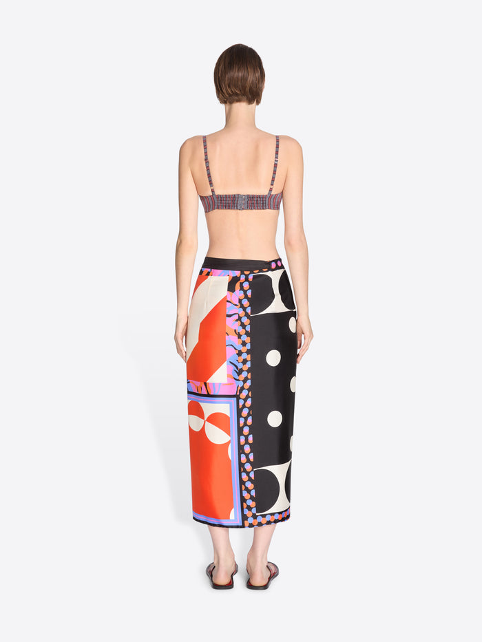 Woman wearing a colorful patterned dress on a white background - Dries Van Noten