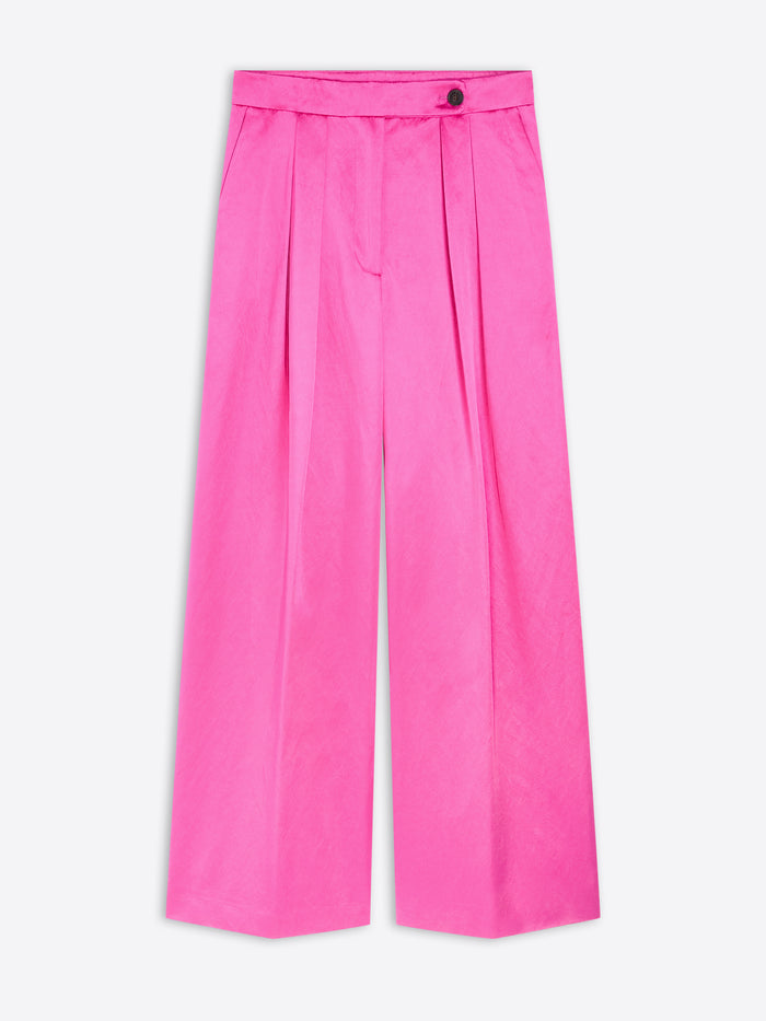 Bright pink pants on a white background - Dries Van Noten