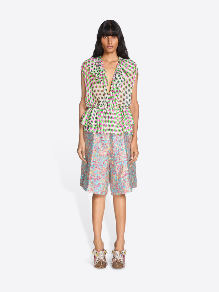 Woman wearing a patterned dress on a white background - Dries Van Noten