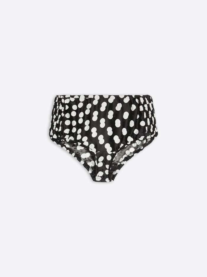 Black high-waisted bikini bottom with white polka dots on a light gray background - Dries Van Noten