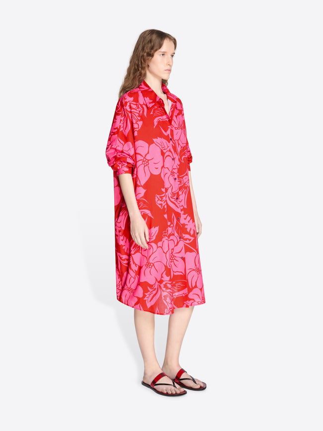 Woman wearing a red floral dress on a white background - Dries Van Noten