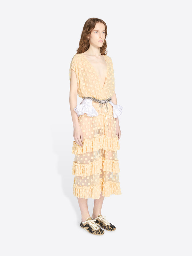 Woman wearing a yellow dress with a white background - Dries Van Noten