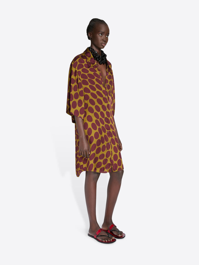 Woman wearing a patterned dress on a white background - Dries Van Noten