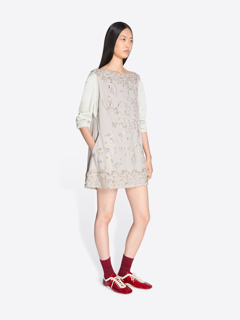 Woman wearing a floral dress with a plain background - Dries Van Noten