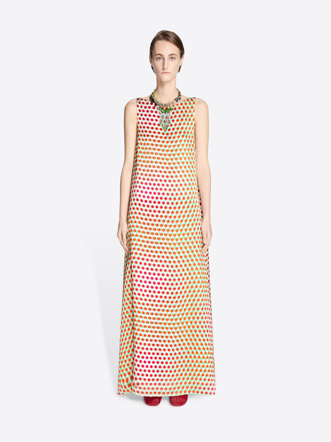 Woman wearing a colorful patterned dress on a white background - Dries Van Noten