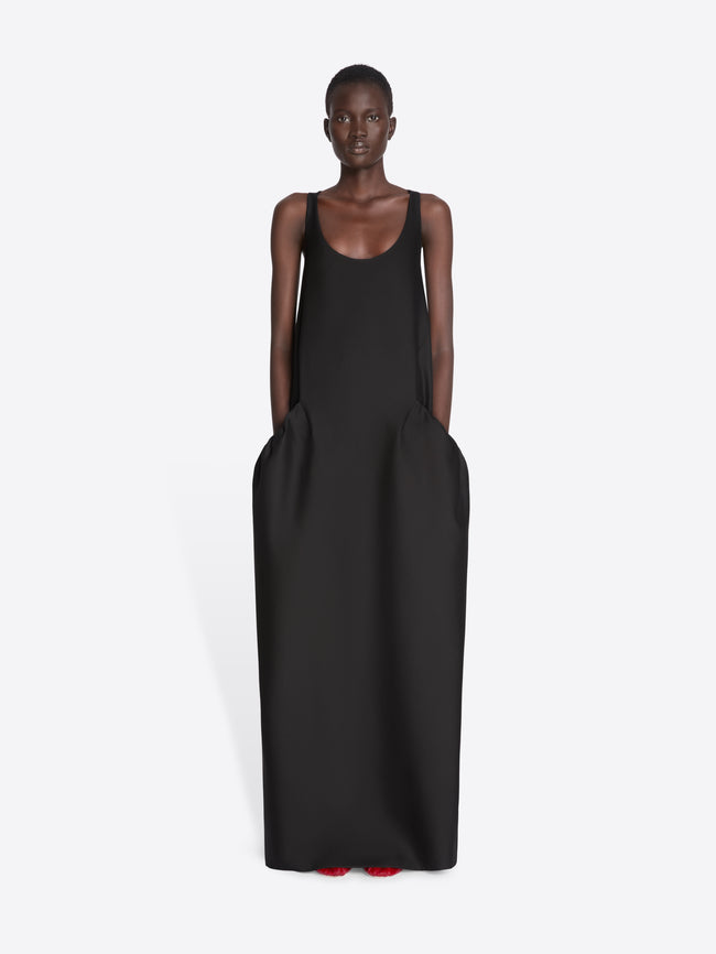 Black sleeveless dress worn by a model on a white background - Dries Van Noten