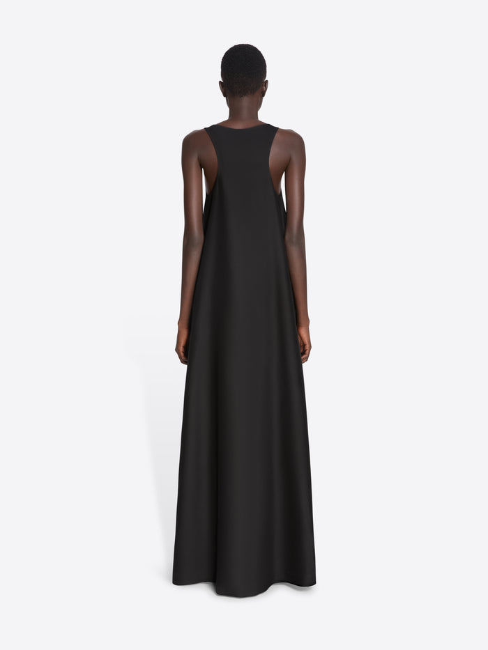 Black sleeveless dress worn by a model on a white background - Dries Van Noten