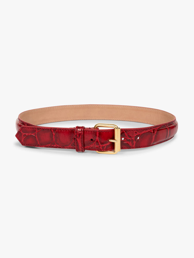 Red crocodile-patterned belt with a gold buckle on a white background - Dries Van Noten
