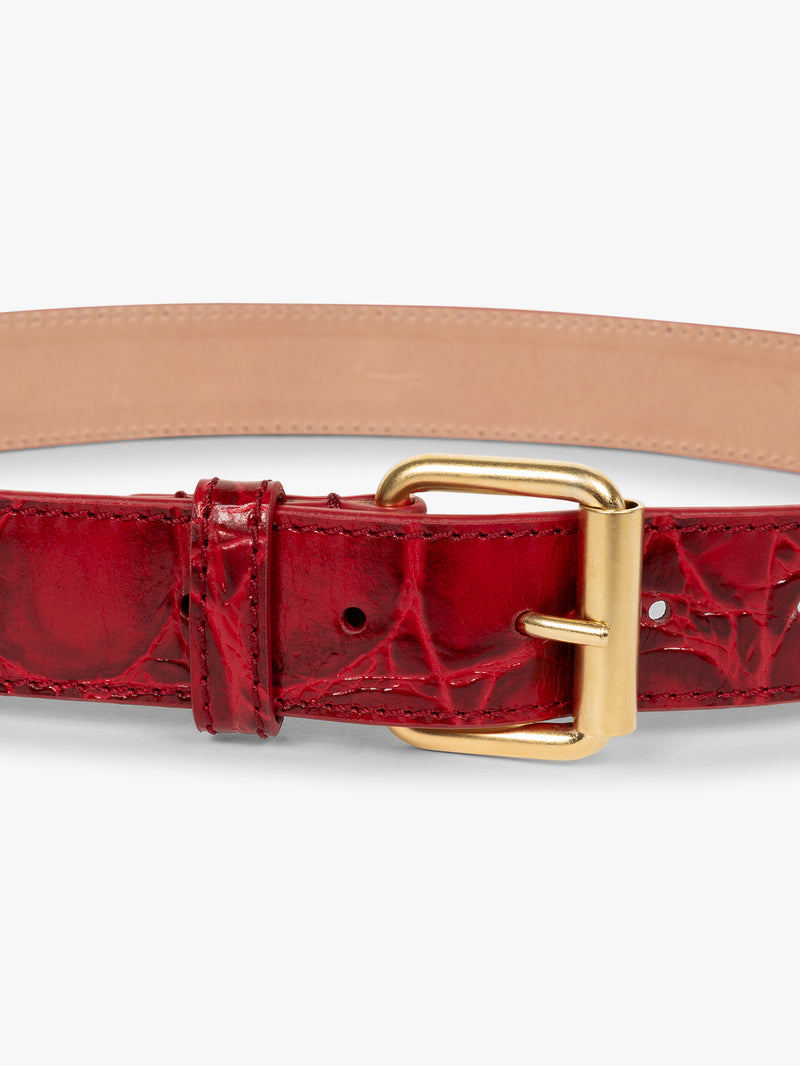 Red belt with gold buckle on a white background - Dries Van Noten
