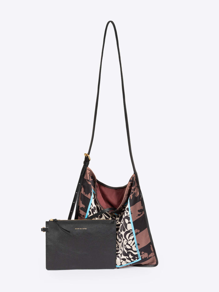 Multicolored patterned handbag with a black strap on a light gray background - Dries Van Noten