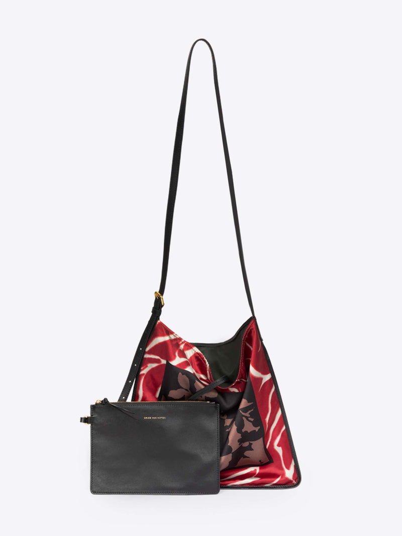 Black and red patterned handbag with a matching pouch on a white background - Dries Van Noten