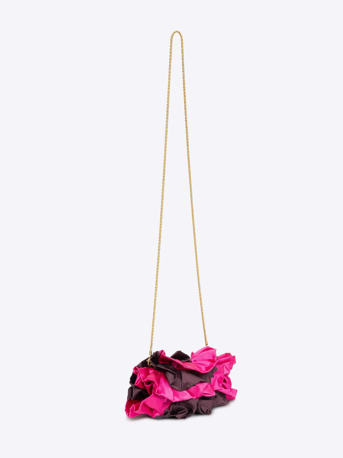 Pink and black floral handbag with a long strap on a white background - Dries Van Noten