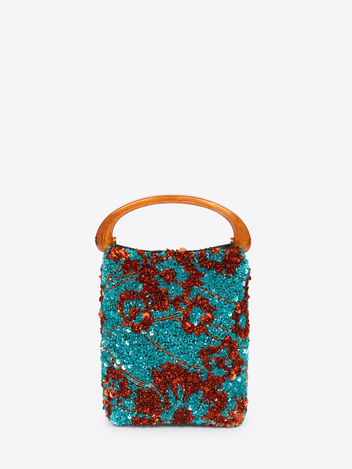 Turquoise handbag with red floral pattern and wooden handle on a white background - Dries Van Noten