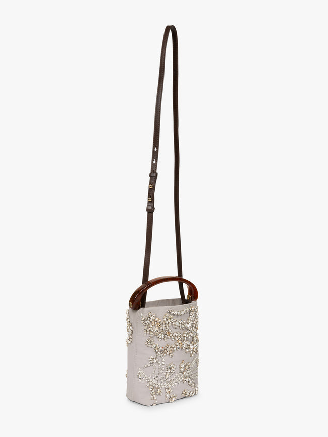Small handbag with decorative elements on a white background - Dries Van Noten