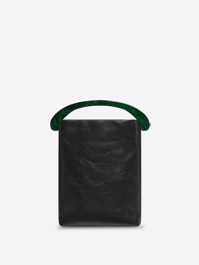 Black leather handbag with green handles on a white background - Dries Van Noten