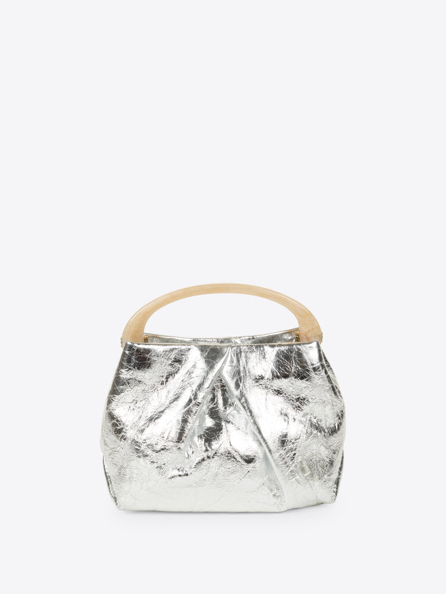 Silver metallic handbag with wooden handle on a white background