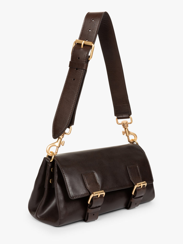 Brown leather handbag with gold hardware on a white background - Dries Van Noten
