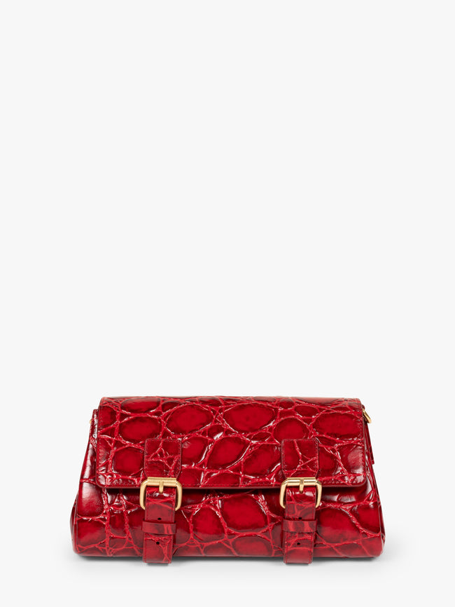 Red crocodile-patterned handbag with gold accents on a white background - Dries Van Noten