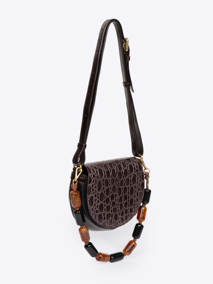Brown crocodile-patterned handbag with black and gold accents on a white background - Dries Van Noten