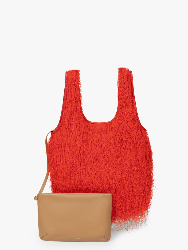 Red textured bag with a beige pouch on a white background - Dries Van Noten