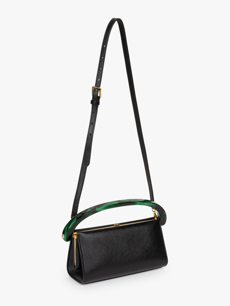 Black handbag with a green accent on a white background - Dries Van Noten