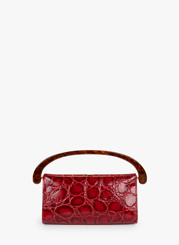 Red handbag with a tortoiseshell handle on a white background - Dries Van Noten