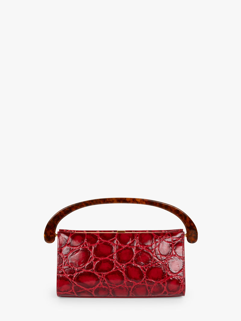 Red handbag with a tortoiseshell handle on a white background - Dries Van Noten