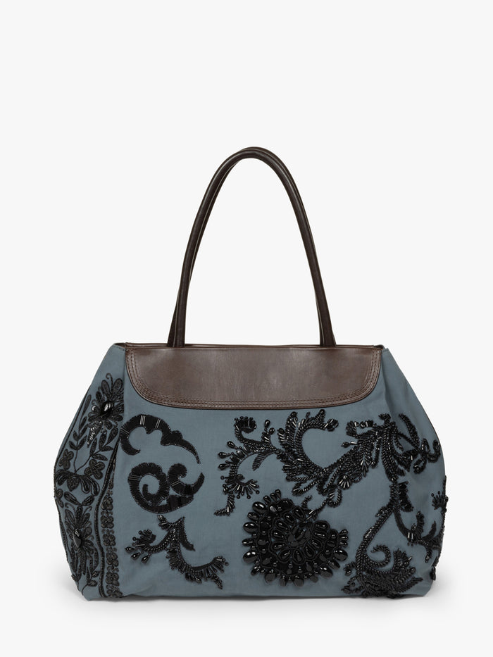 Gray handbag with black floral embroidery on a white background