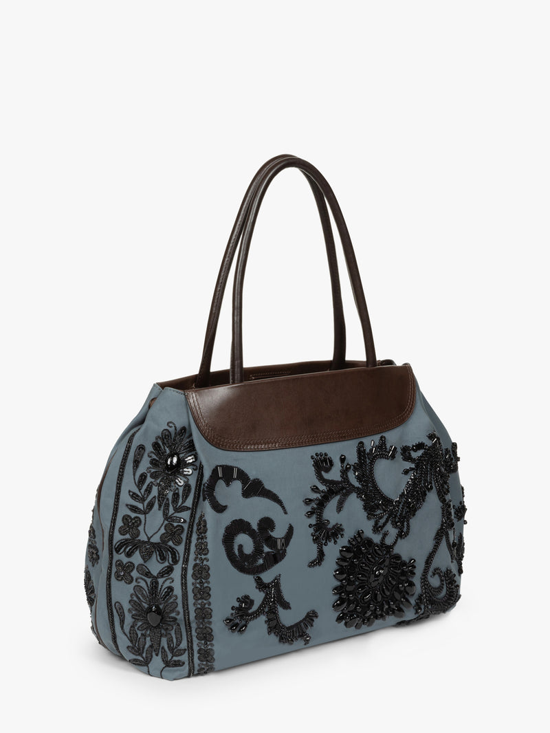 Gray handbag with black floral embroidery and brown leather accents on a white background - Dries Van Noten
