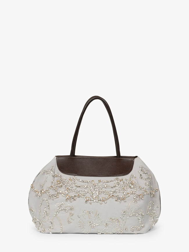 Handbag with floral embroidery and brown leather top handle on a white background - Dries Van Noten