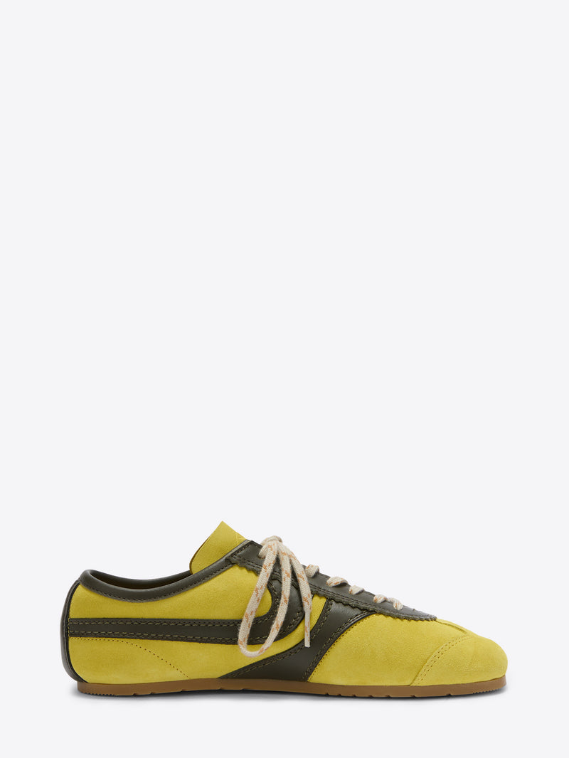 Yellow and black sneaker on a white background