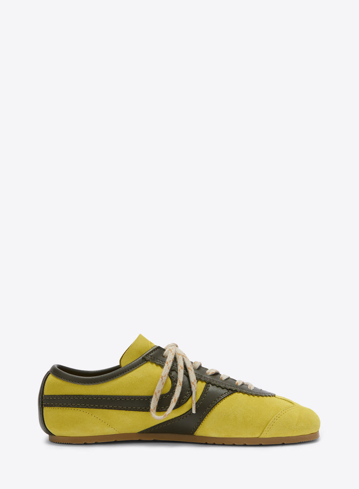 Yellow and black sneaker on a white background