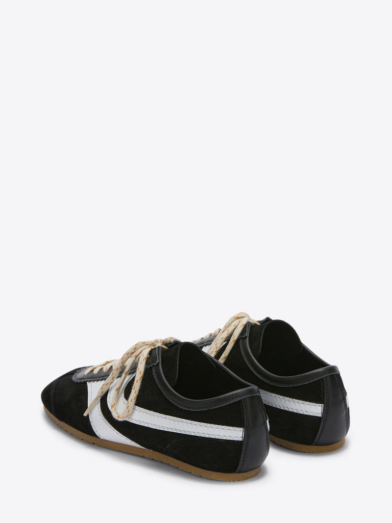 Black sneakers with white stripes on a white background