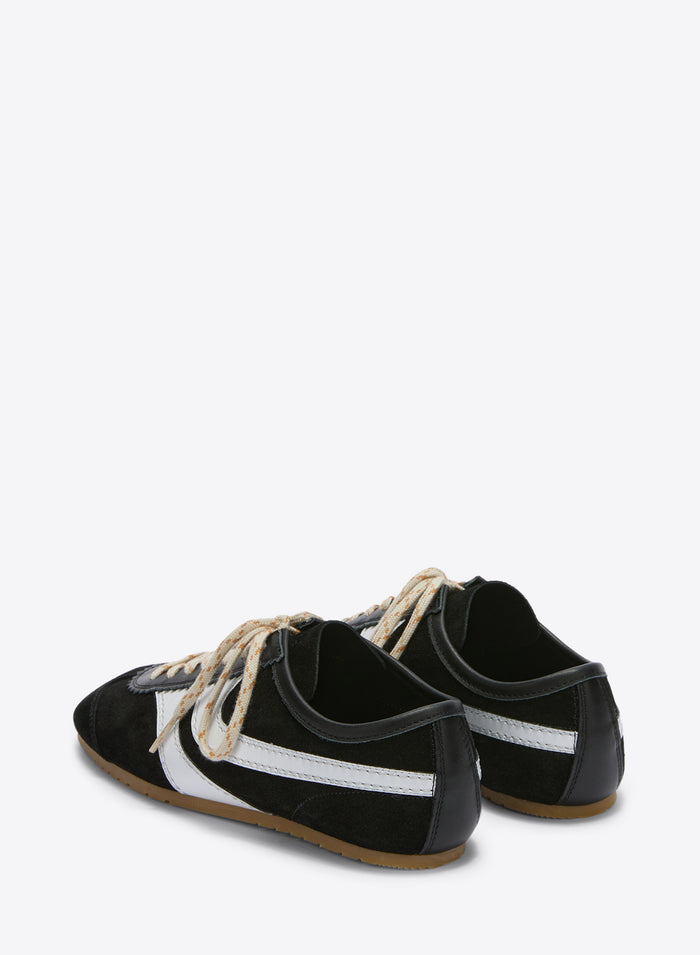 Black sneakers with white stripes on a white background