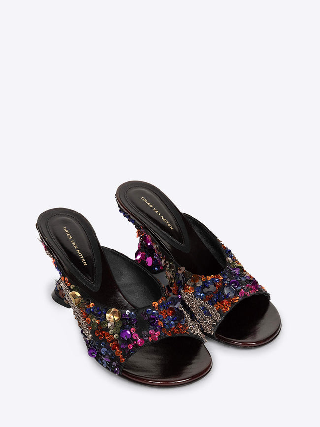 Pair of black high-heeled sandals with colorful embellishments on a white background - Dries Van Noten